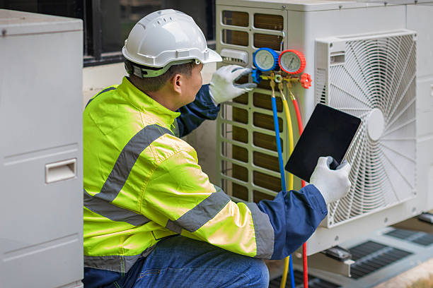 Professional Hvac technician working in Chesapeake Beach, MD